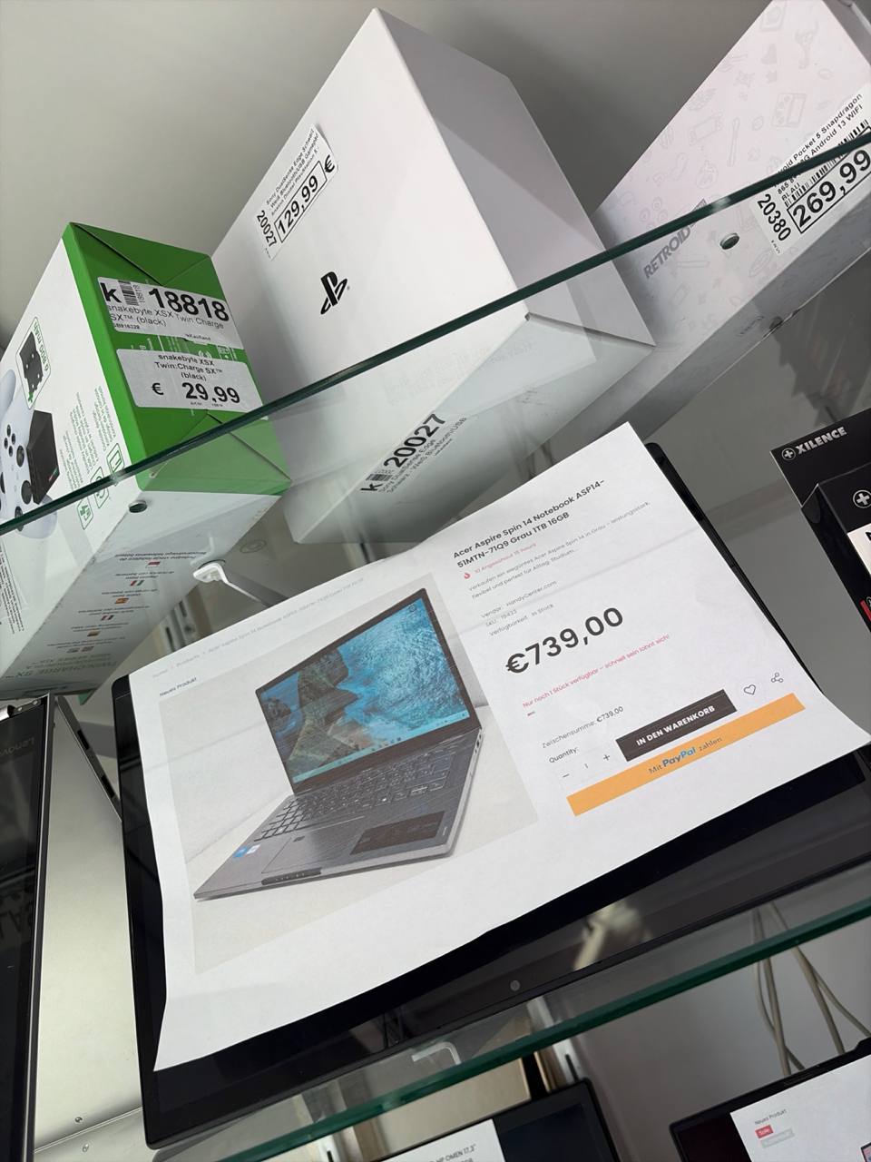 Produkte im Bild ## 2. PlayStation 5 (oben rechts) Zweitbild